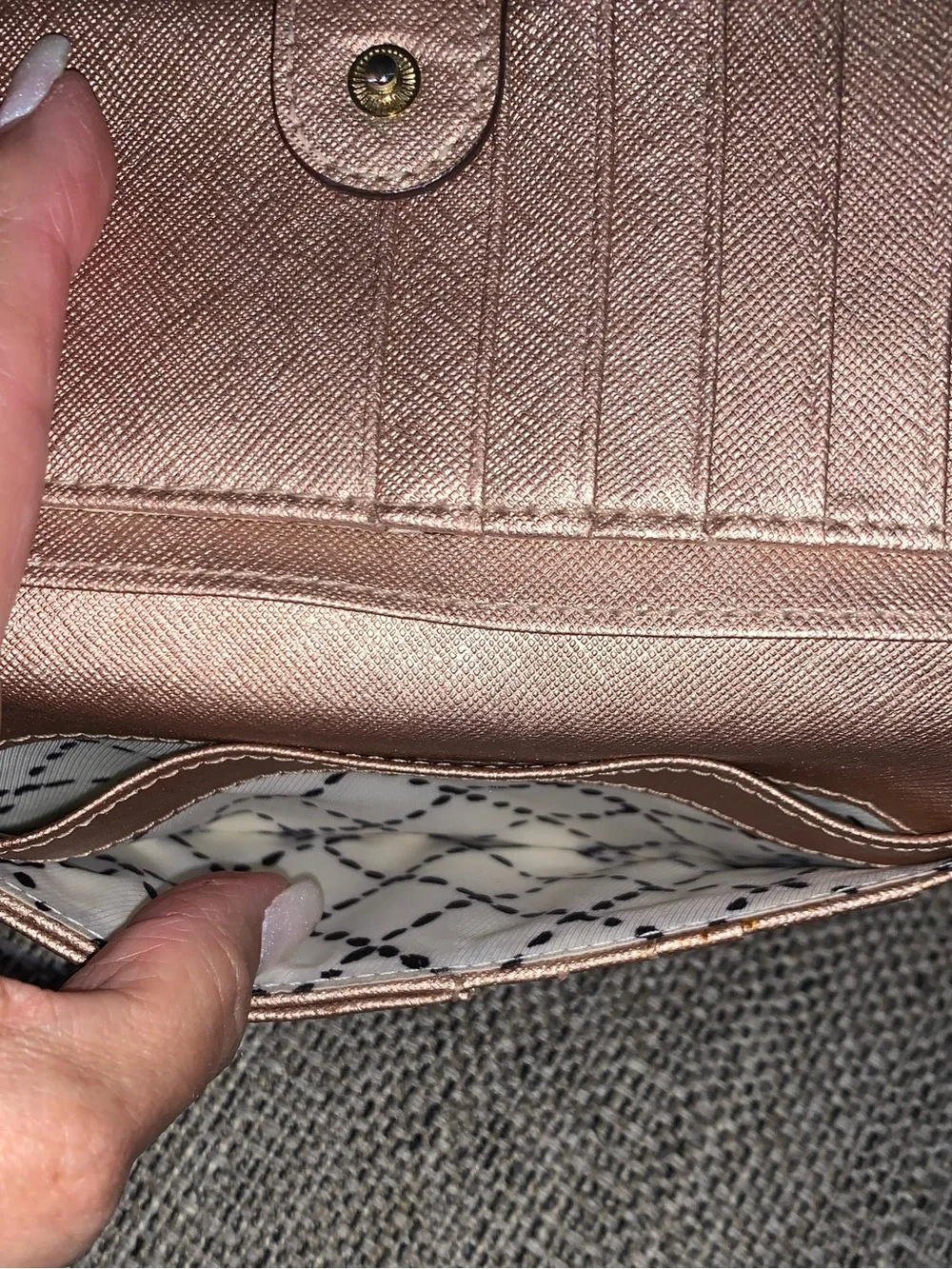 Kate Spade rose gold wallet with callouts